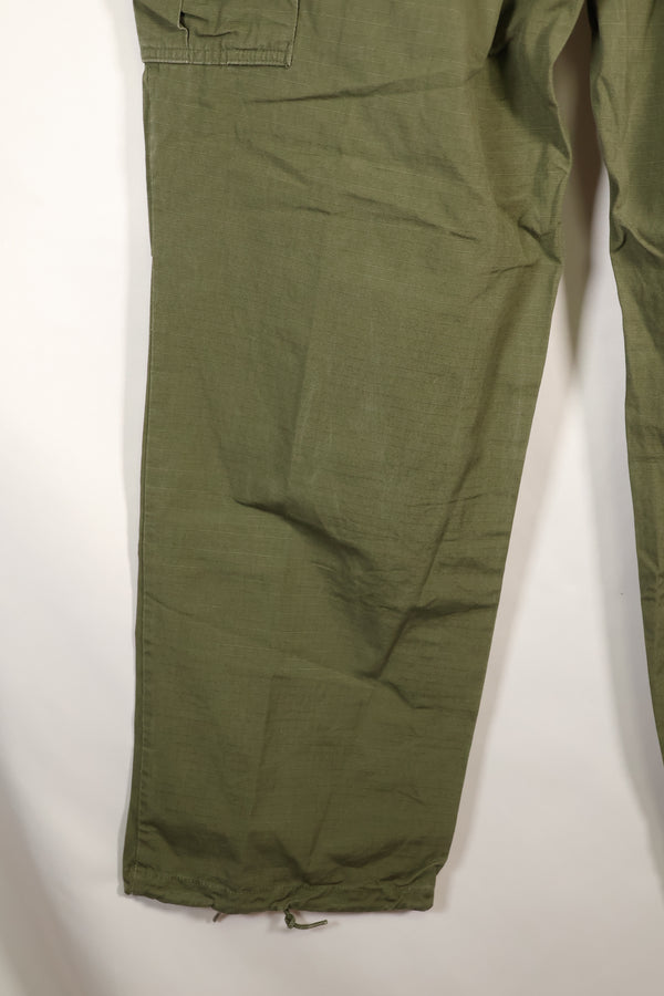 1967 Contract L-L 4th Model Jungle Fatigue Pants in good condition, faded, used.