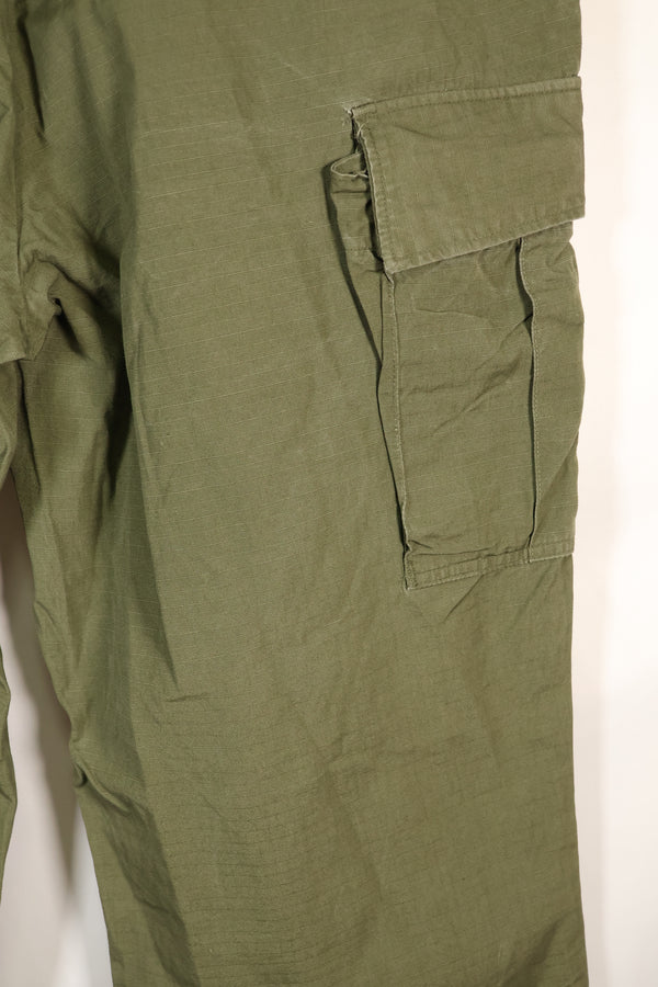 1967 Contract L-L 4th Model Jungle Fatigue Pants in good condition, faded, used.