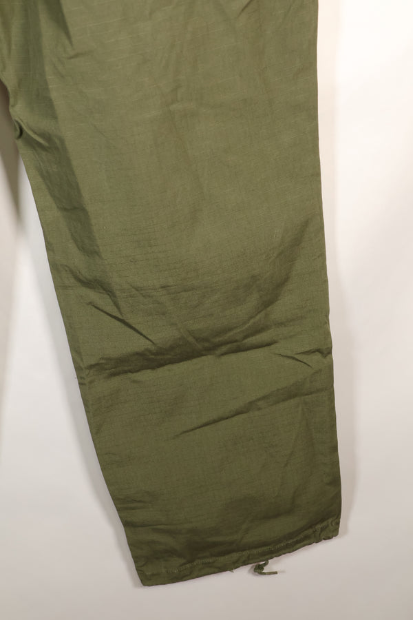 1967 Contract L-L 4th Model Jungle Fatigue Pants in good condition, faded, used.