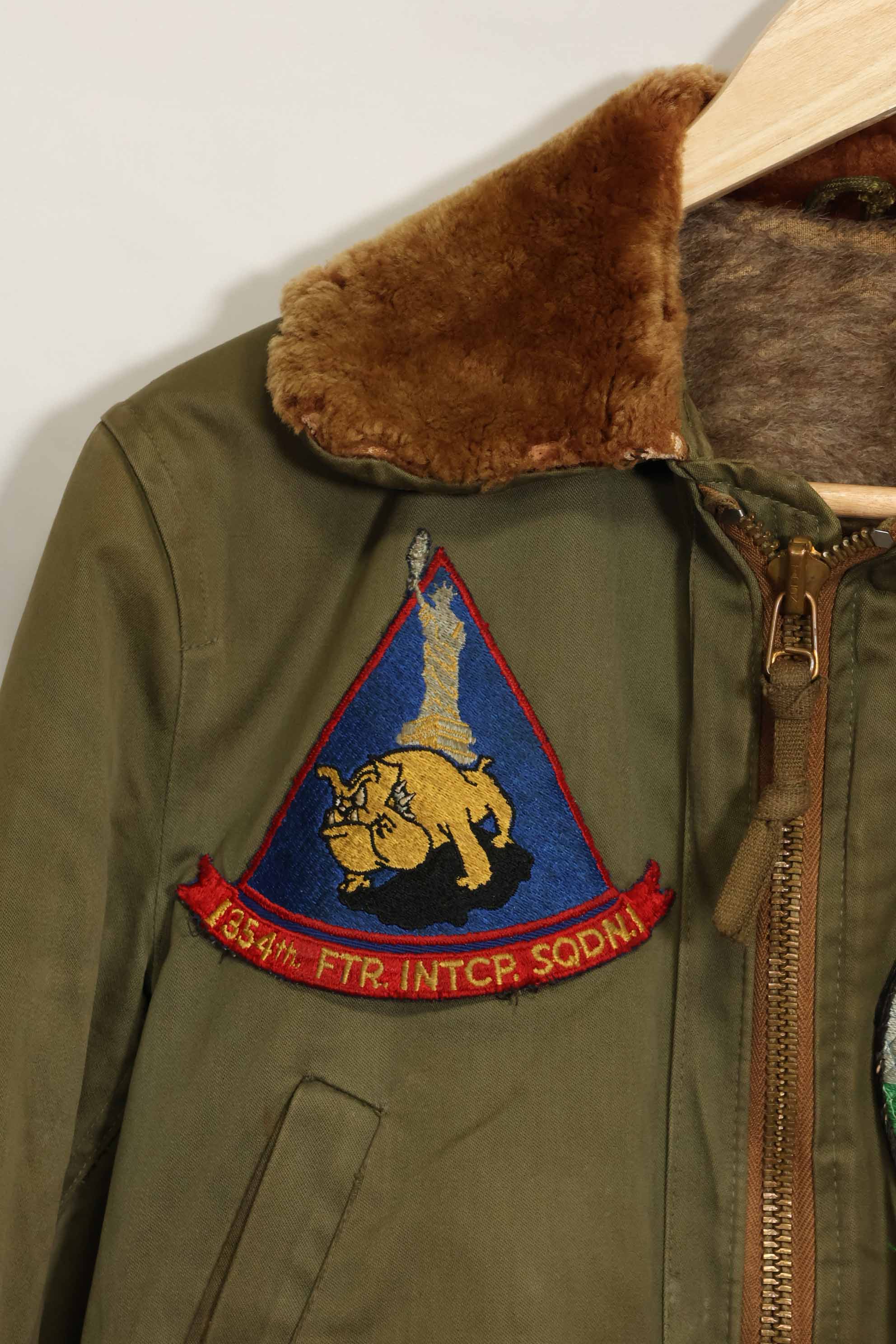 1940s U.S. Army Air Corps B-15 flight jacket with air race patch, used.