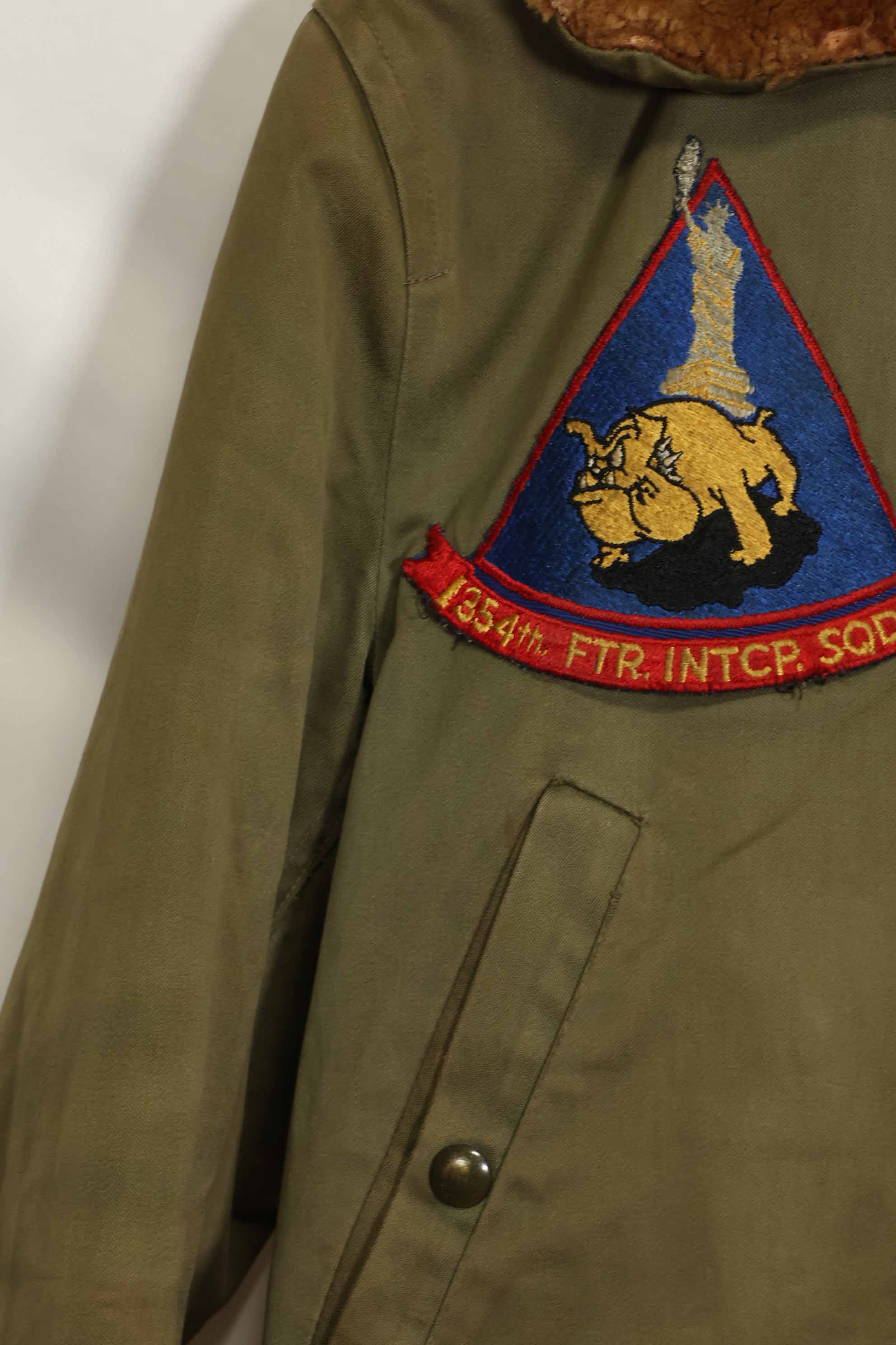 1940s U.S. Army Air Corps B-15 flight jacket with air race patch, used.