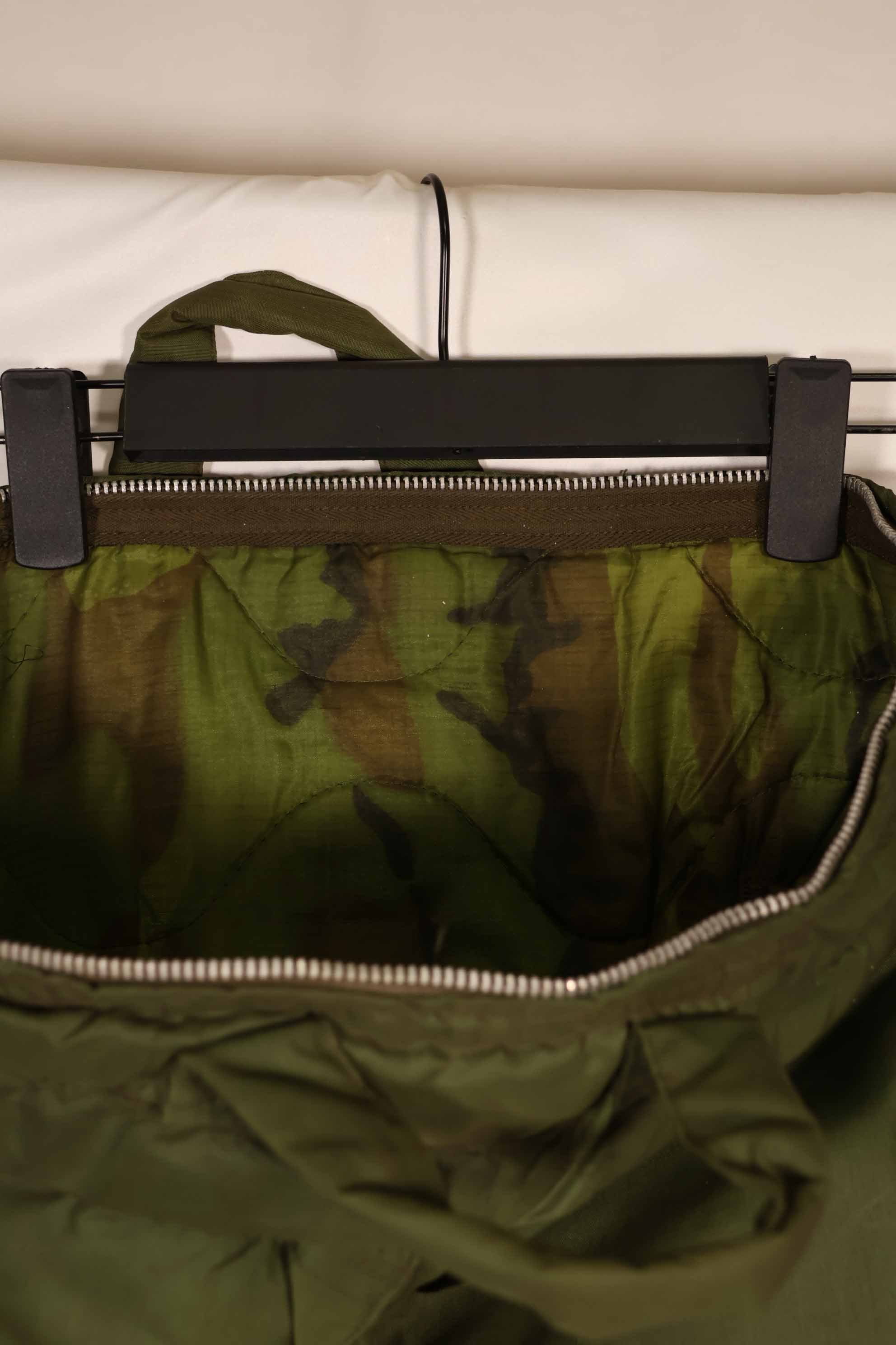 Real 1970 U.S. Army helmet bag, ERDL camouflage lining, rare, used.