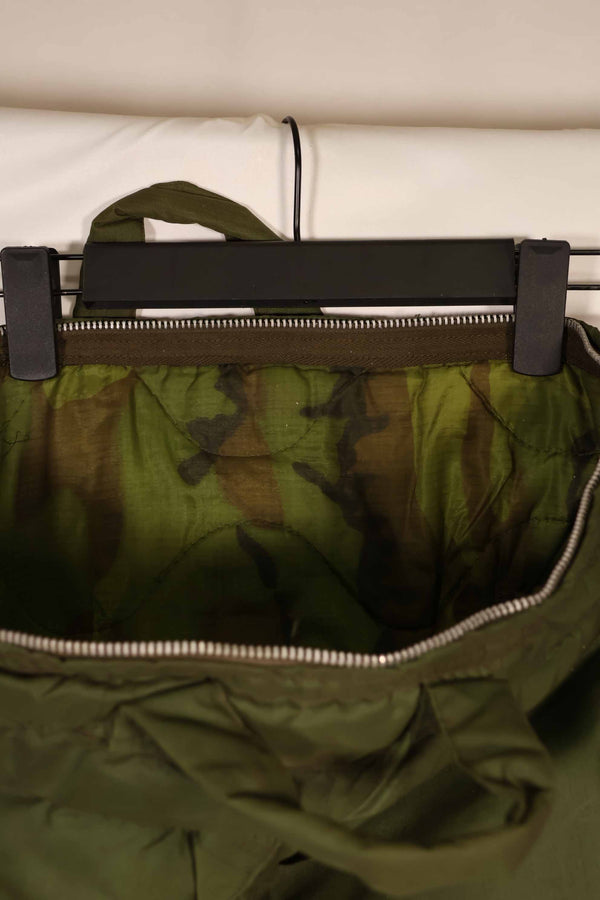 Real 1970 U.S. Army helmet bag, ERDL camouflage lining, rare, used.