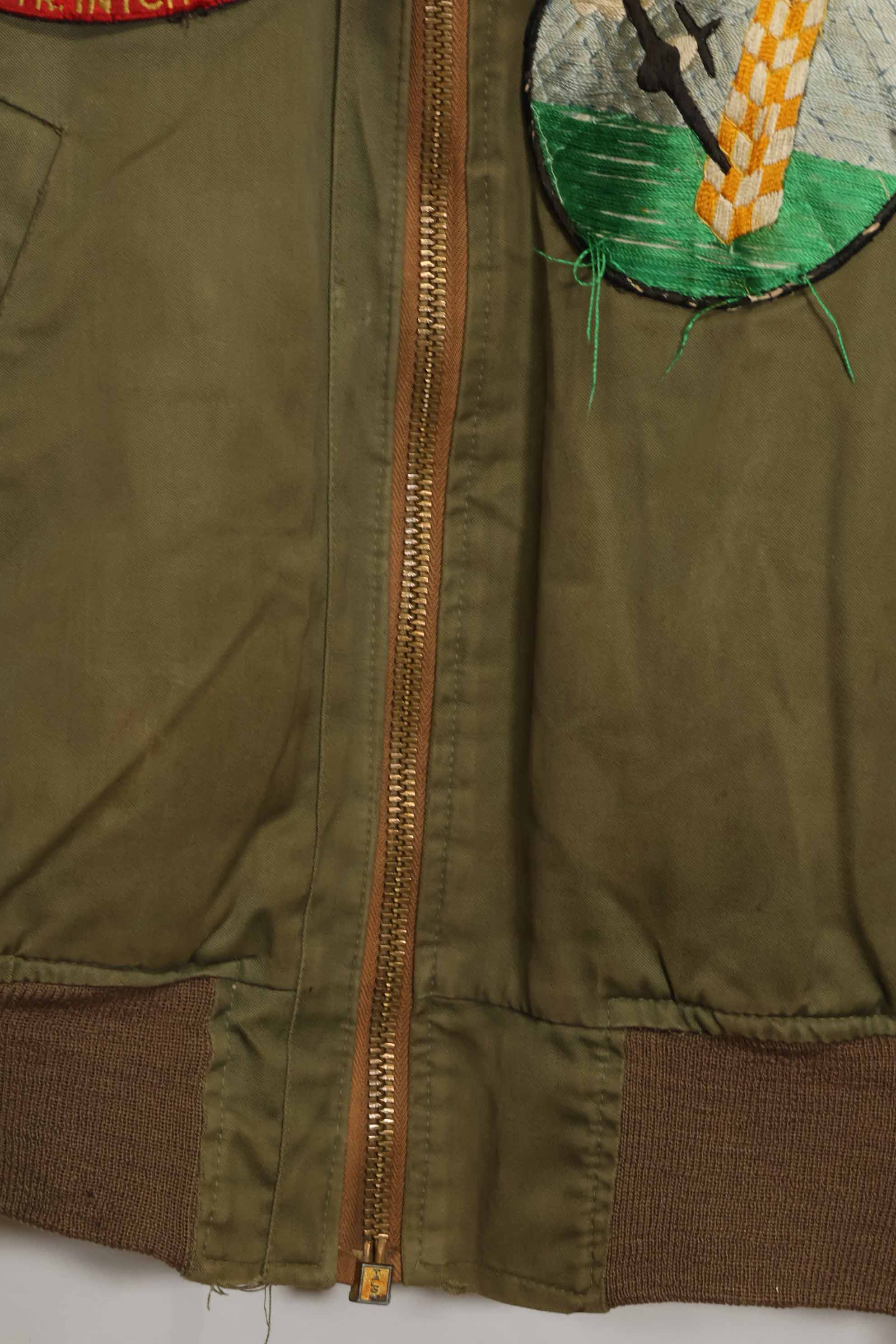 1940s U.S. Army Air Corps B-15 flight jacket with air race patch, used.