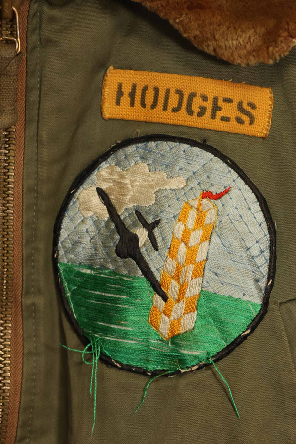 1940s U.S. Army Air Corps B-15 flight jacket with air race patch, used.