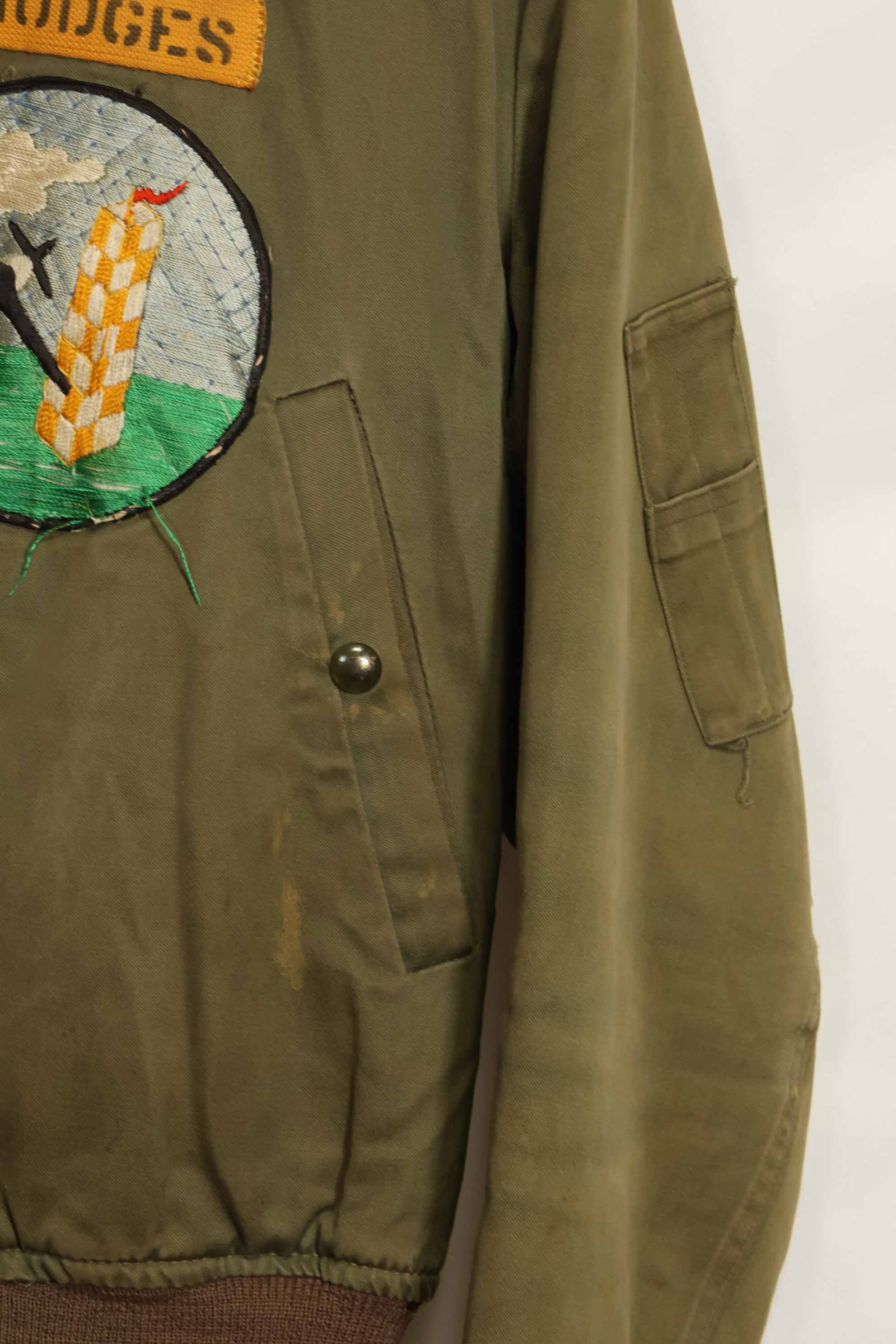 1940s U.S. Army Air Corps B-15 flight jacket with air race patch, used.