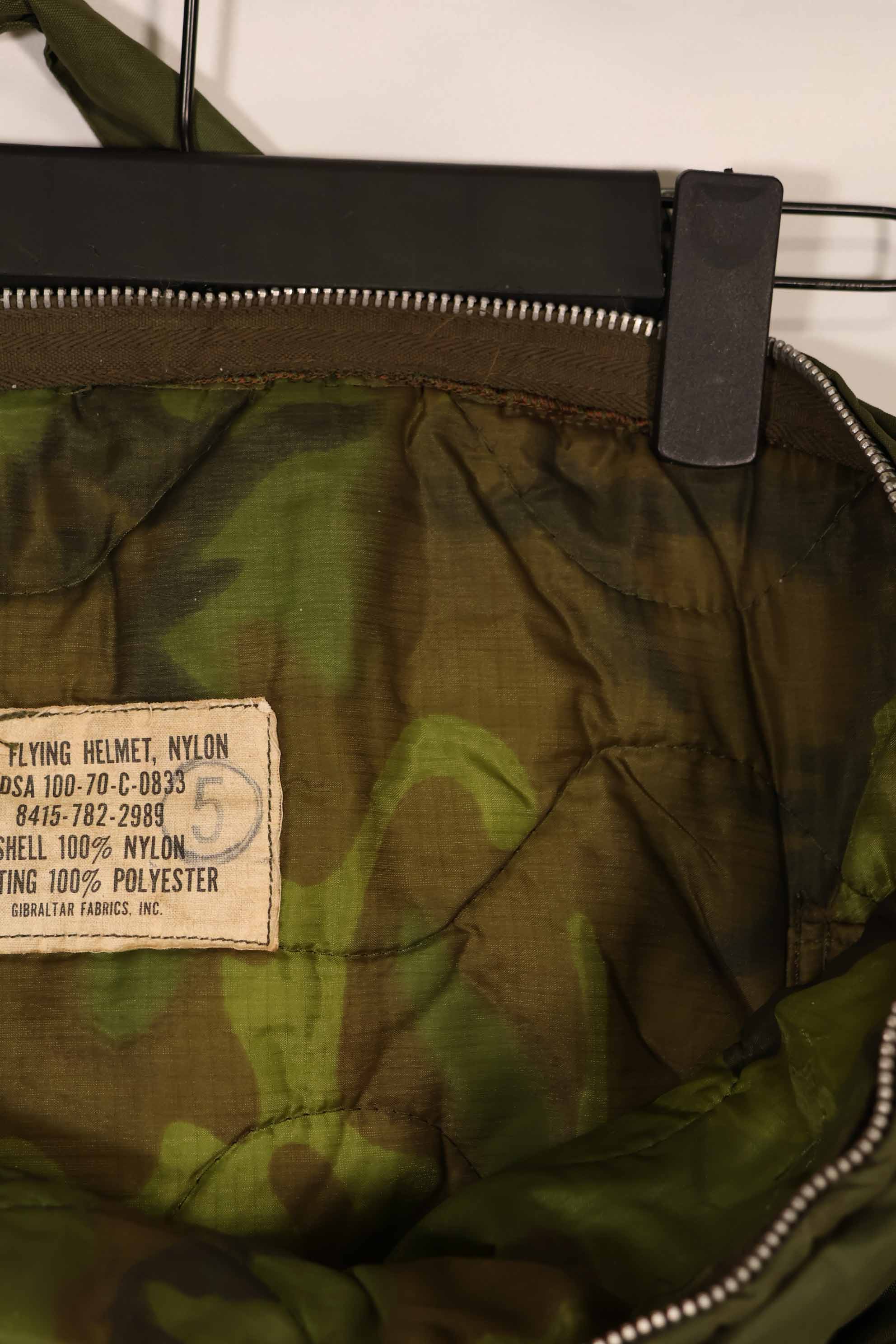 Real 1970 U.S. Army helmet bag, ERDL camouflage lining, rare, used.