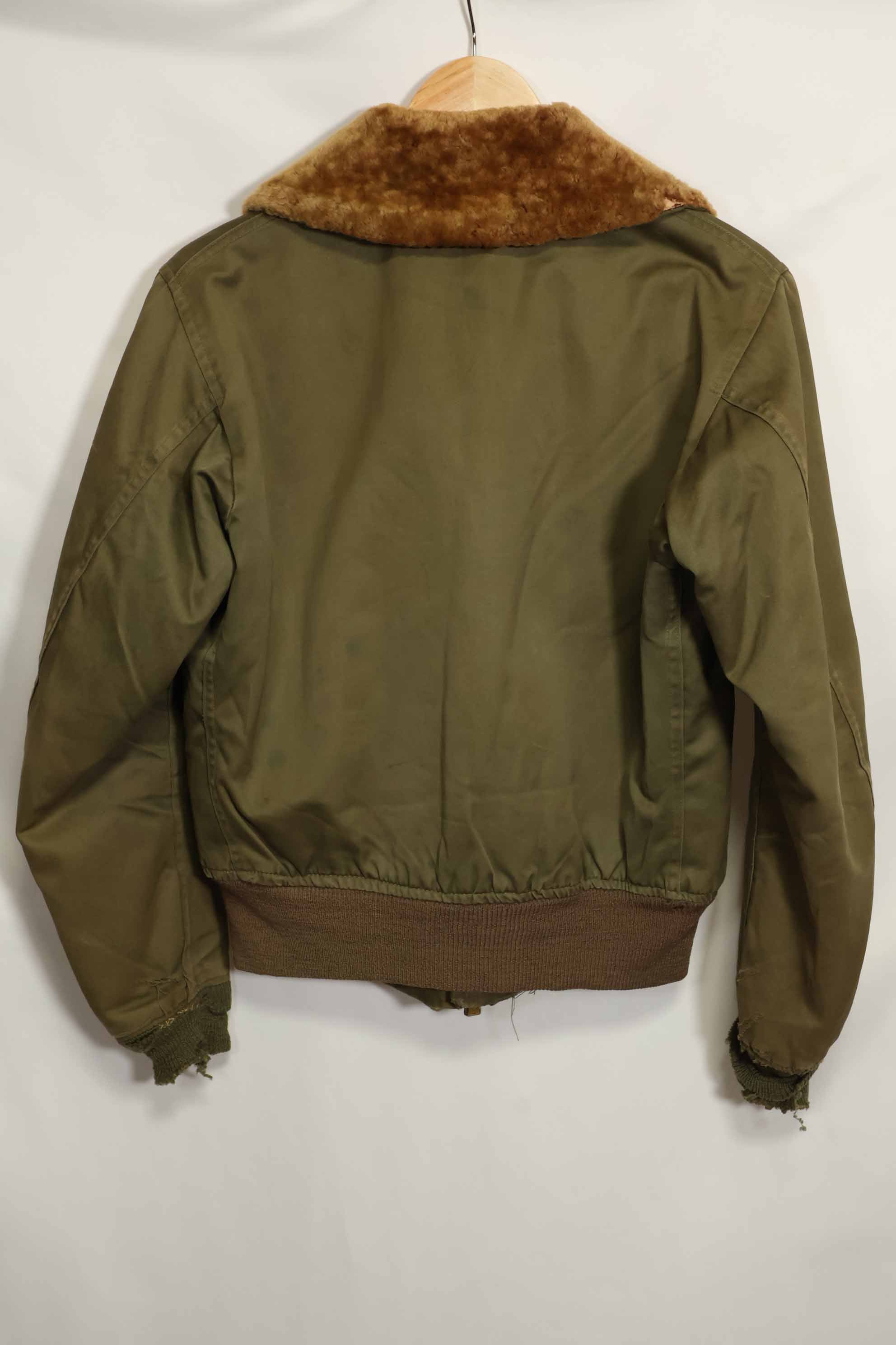 1940s U.S. Army Air Corps B-15 flight jacket with air race patch, used.