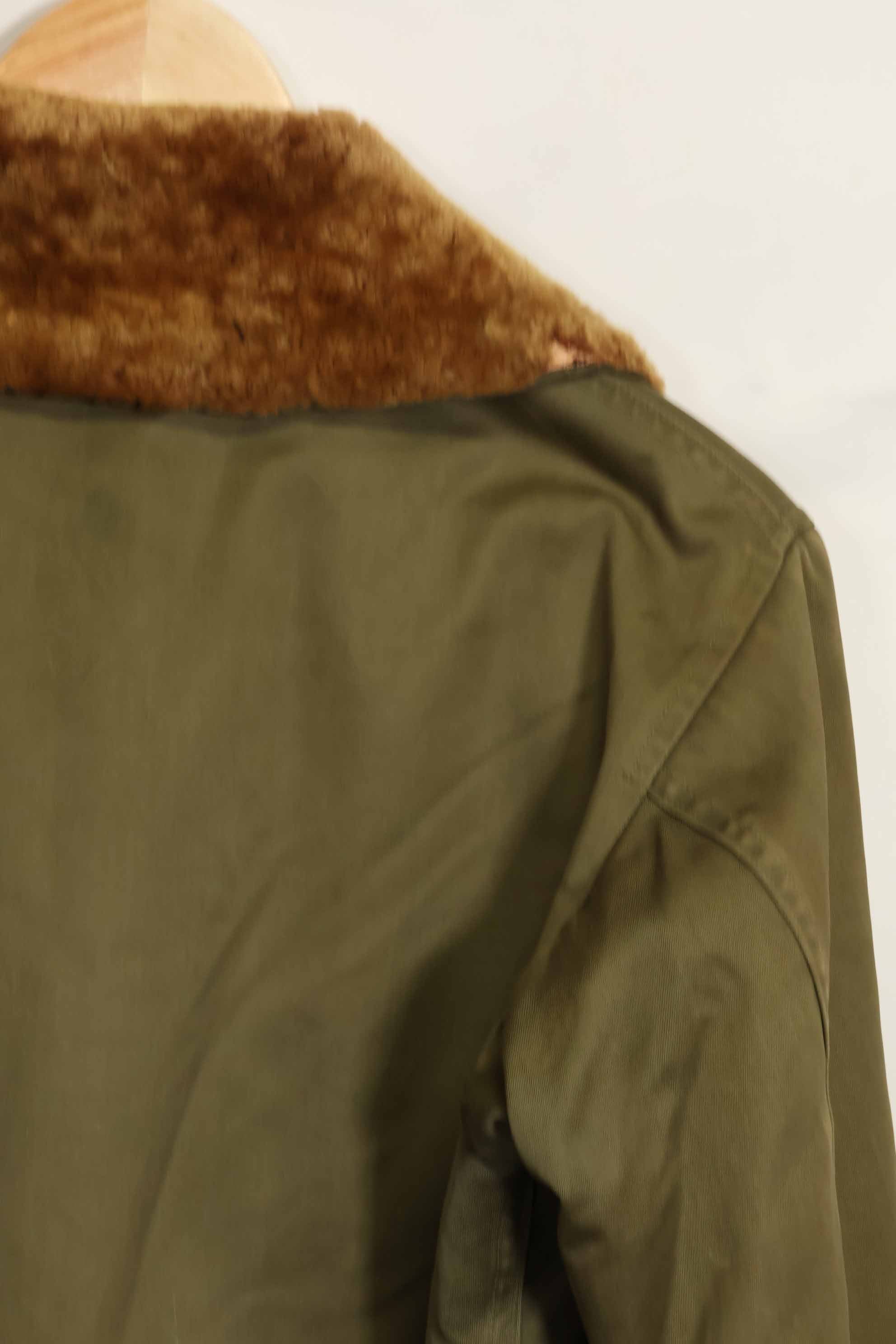 1940s U.S. Army Air Corps B-15 flight jacket with air race patch, used.