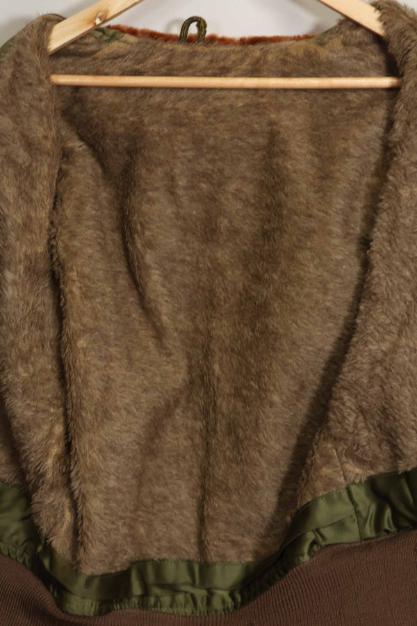 1940s U.S. Army Air Corps B-15 flight jacket with air race patch, used.