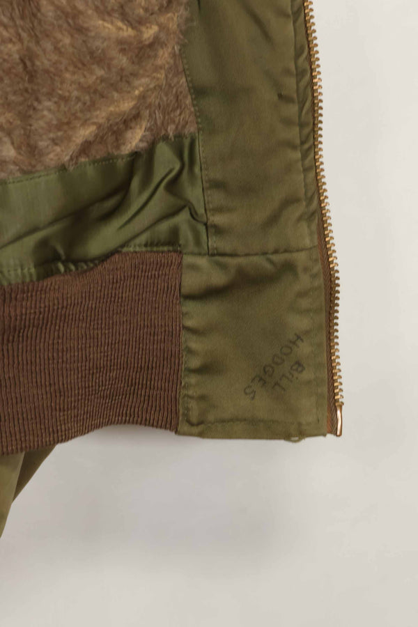 1940s U.S. Army Air Corps B-15 flight jacket with air race patch, used.