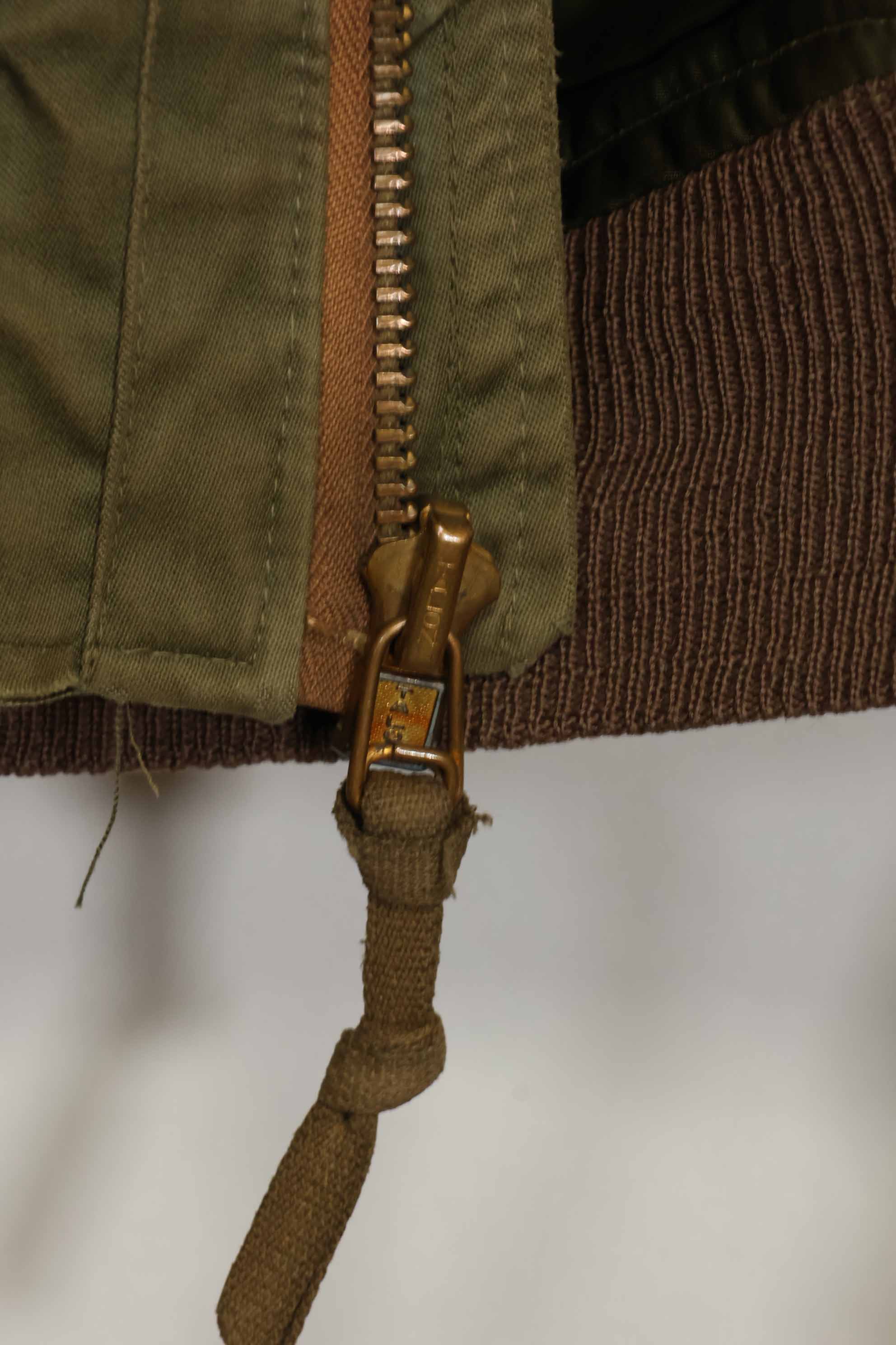 1940s U.S. Army Air Corps B-15 flight jacket with air race patch, used.