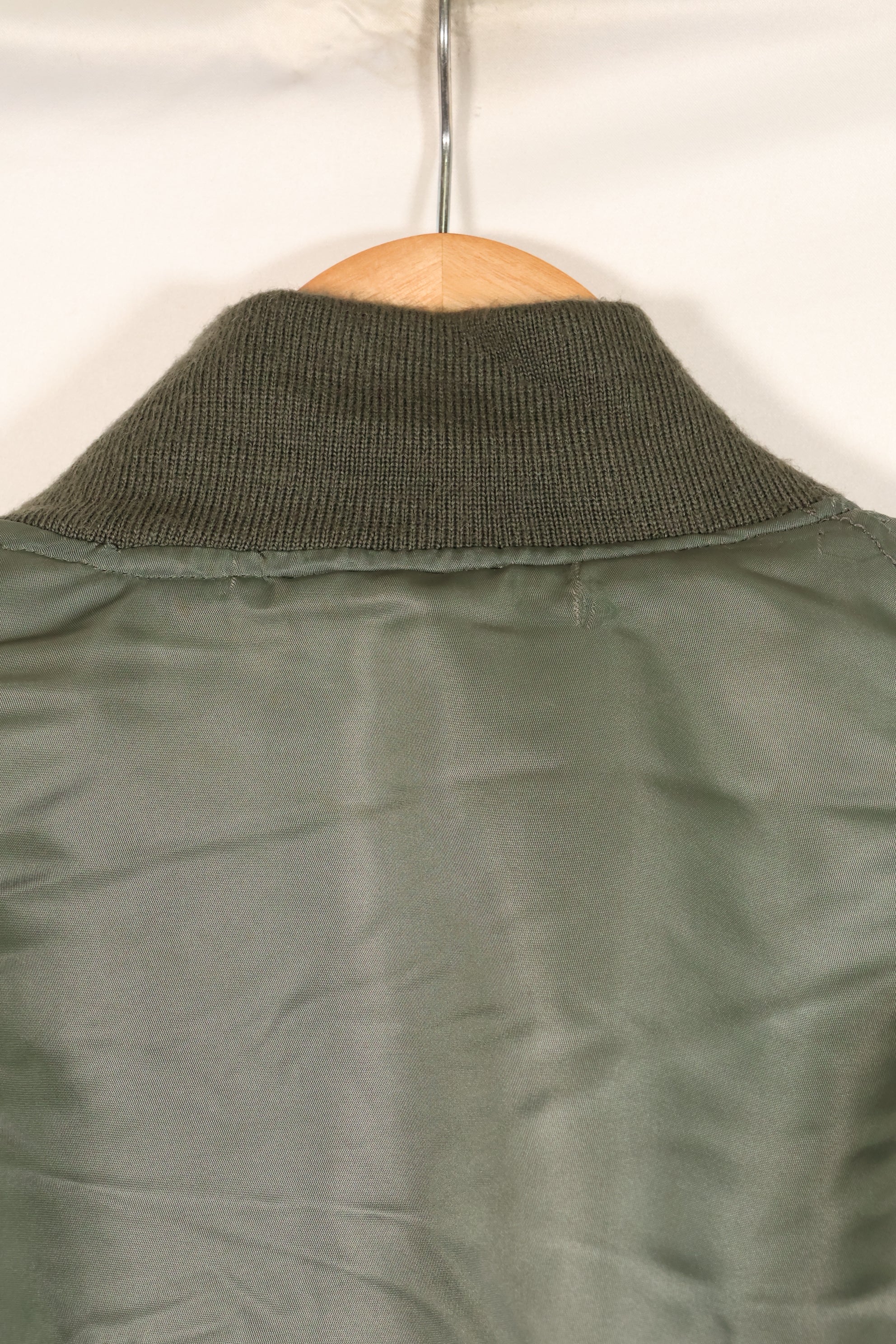 1950s, estimated size 40–42, U.S. Air Force B-15D flight jacket, modified with shearling, includes patches, used