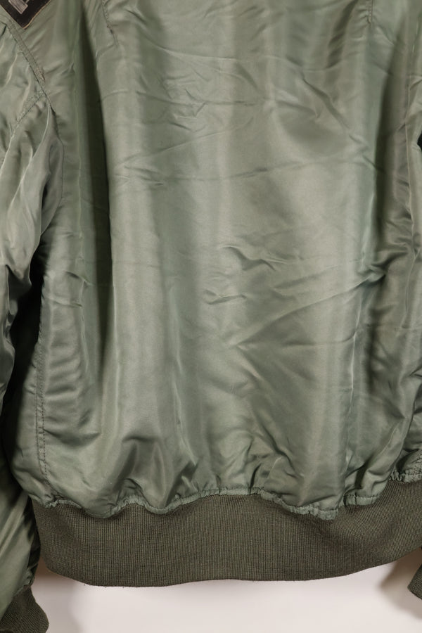 1950s, estimated size 40–42, U.S. Air Force B-15D flight jacket, modified with shearling, includes patches, used