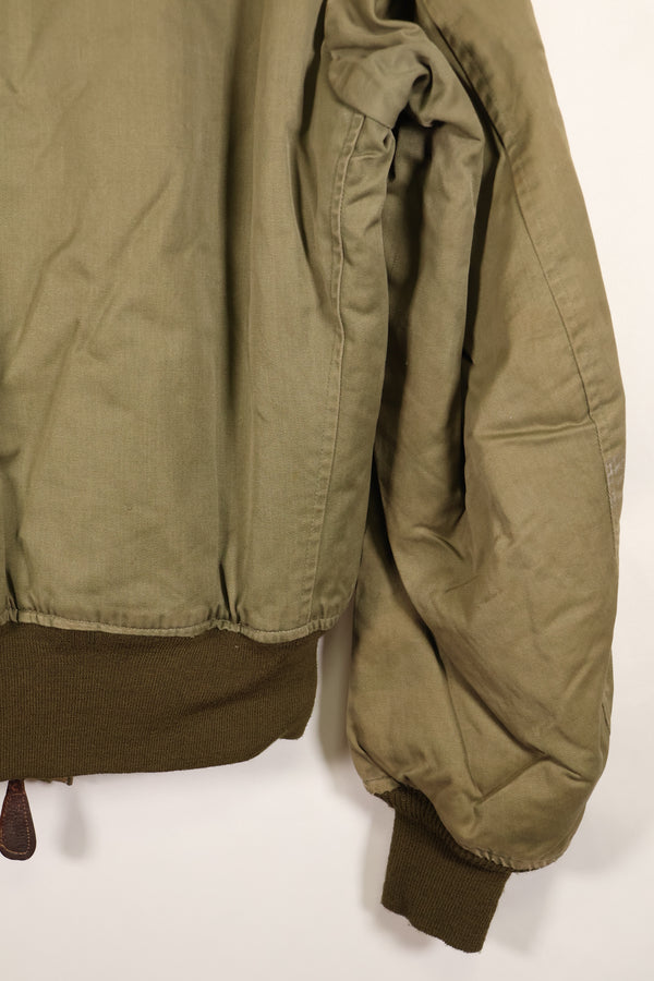 1940s, estimated age 38–40, U.S. Army Air Forces (USAAF) B-15A flight jacket, modified with shearling, used