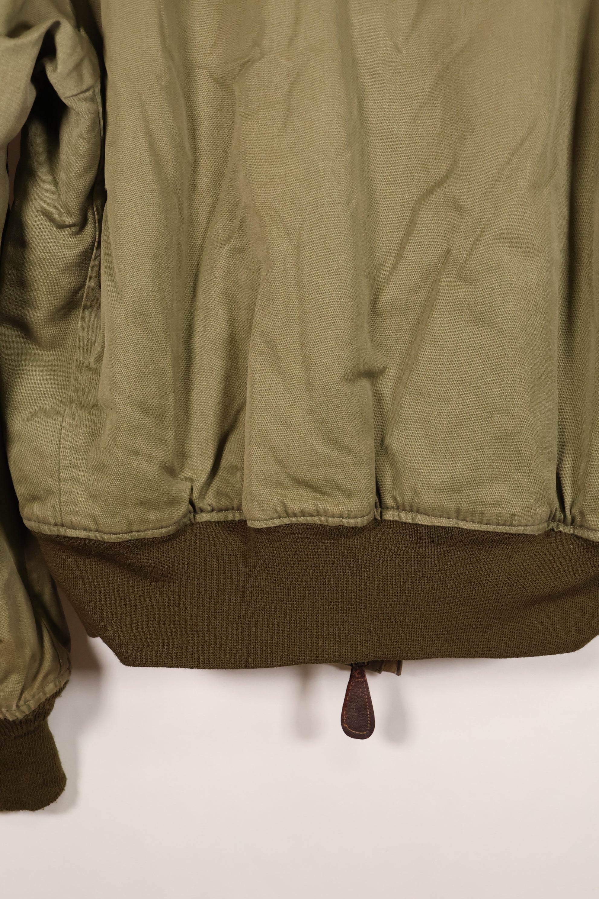1940s, estimated age 38–40, U.S. Army Air Forces (USAAF) B-15A flight jacket, modified with shearling, used