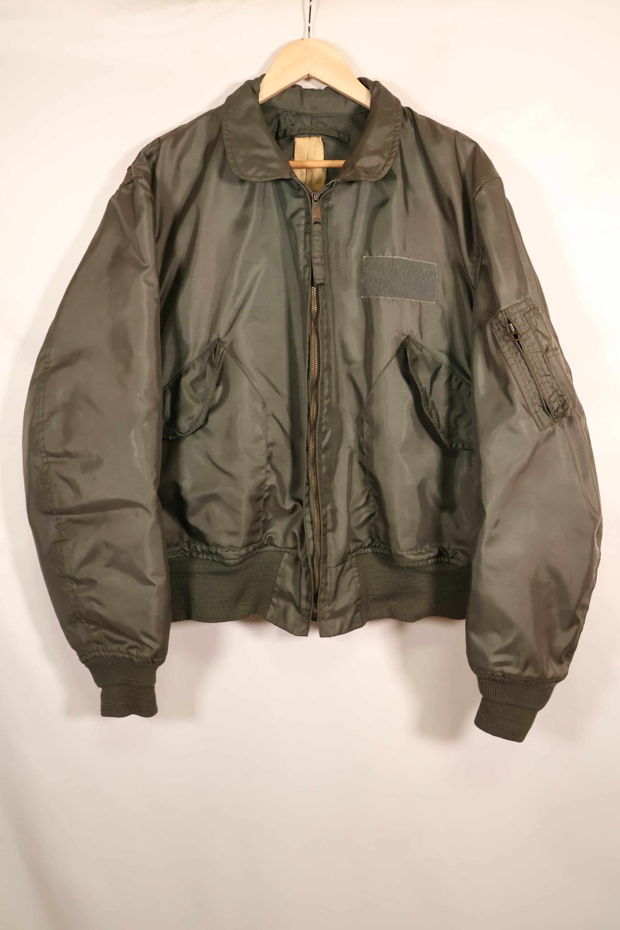 Estimated 1983 Contract, LARGE, U.S. Navy, CWU-45P Flight Jacket with Pleats, Used