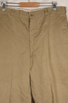 1960s, estimated 34-36 US Army cotton khaki pants, used.