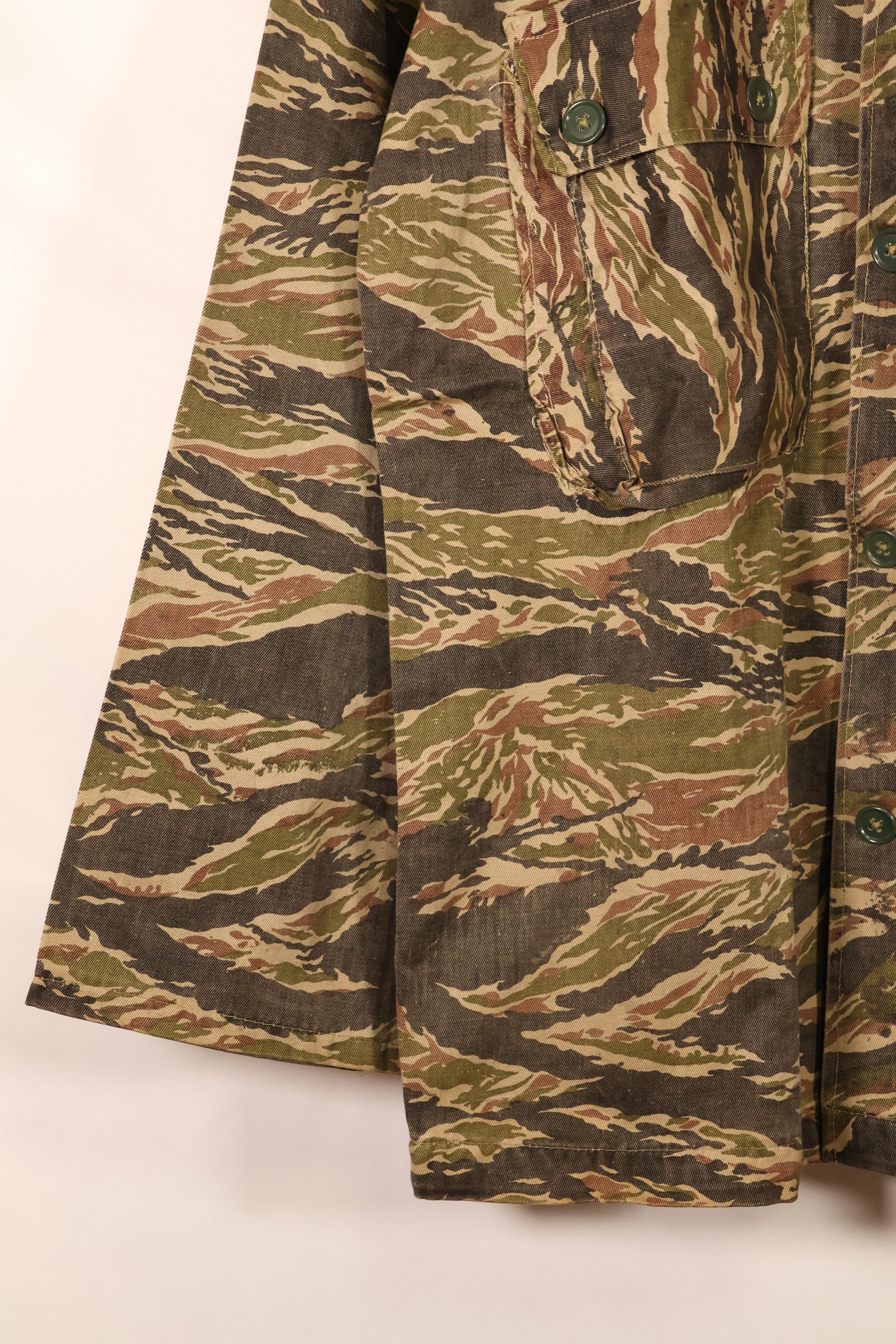 Late 1960s | Locally made | Estimated to be made in Vietnam or Thailand | Tiger-striped shirt | Used