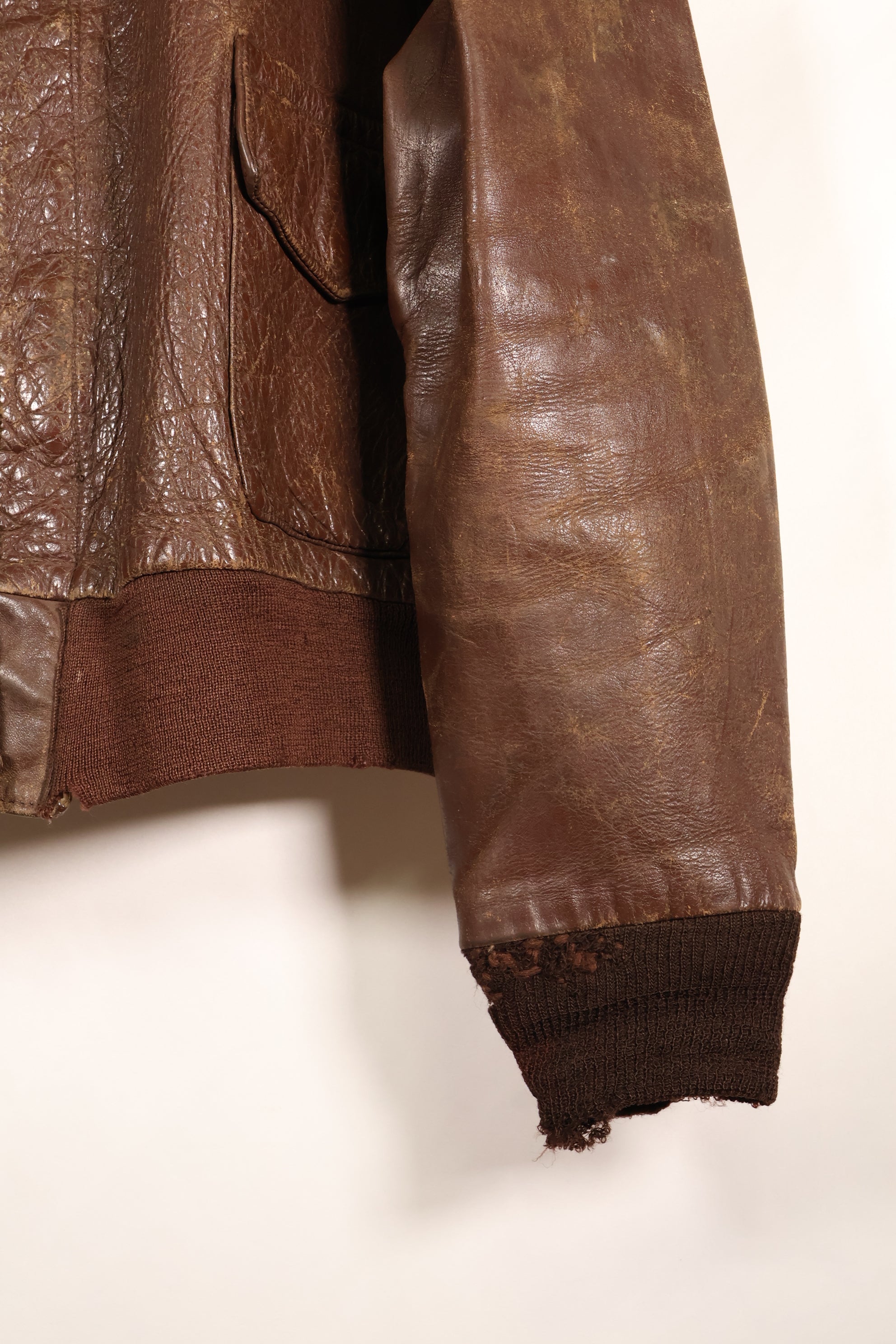 1940s size 42 WWII U.S. Army Air Corps USAAF A-2 flight jacket with name, used.