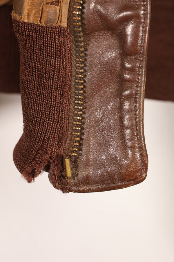 1940s size 42 WWII U.S. Army Air Corps USAAF A-2 flight jacket with name, used.