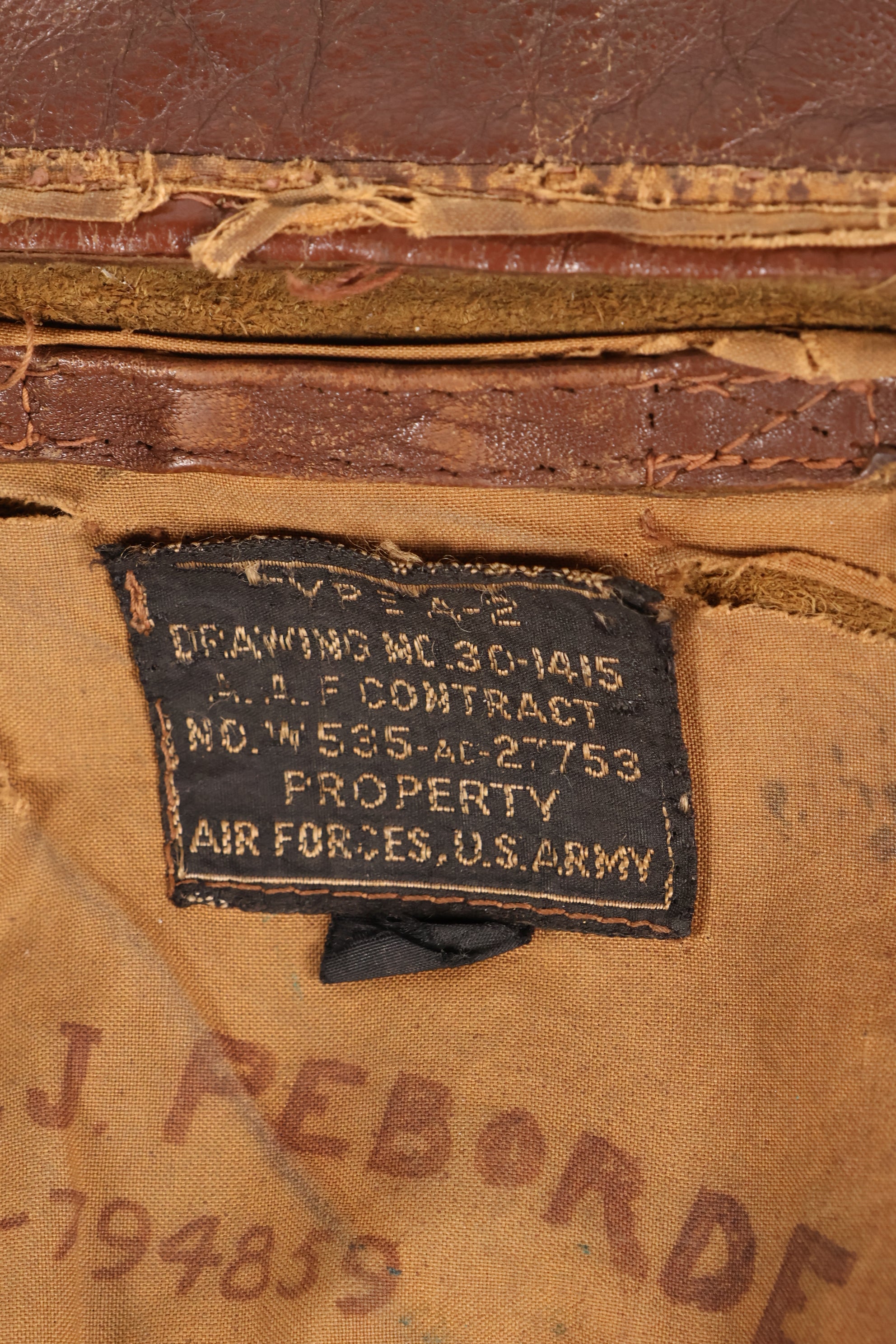 1940s size 42 WWII U.S. Army Air Corps USAAF A-2 flight jacket with name, used.