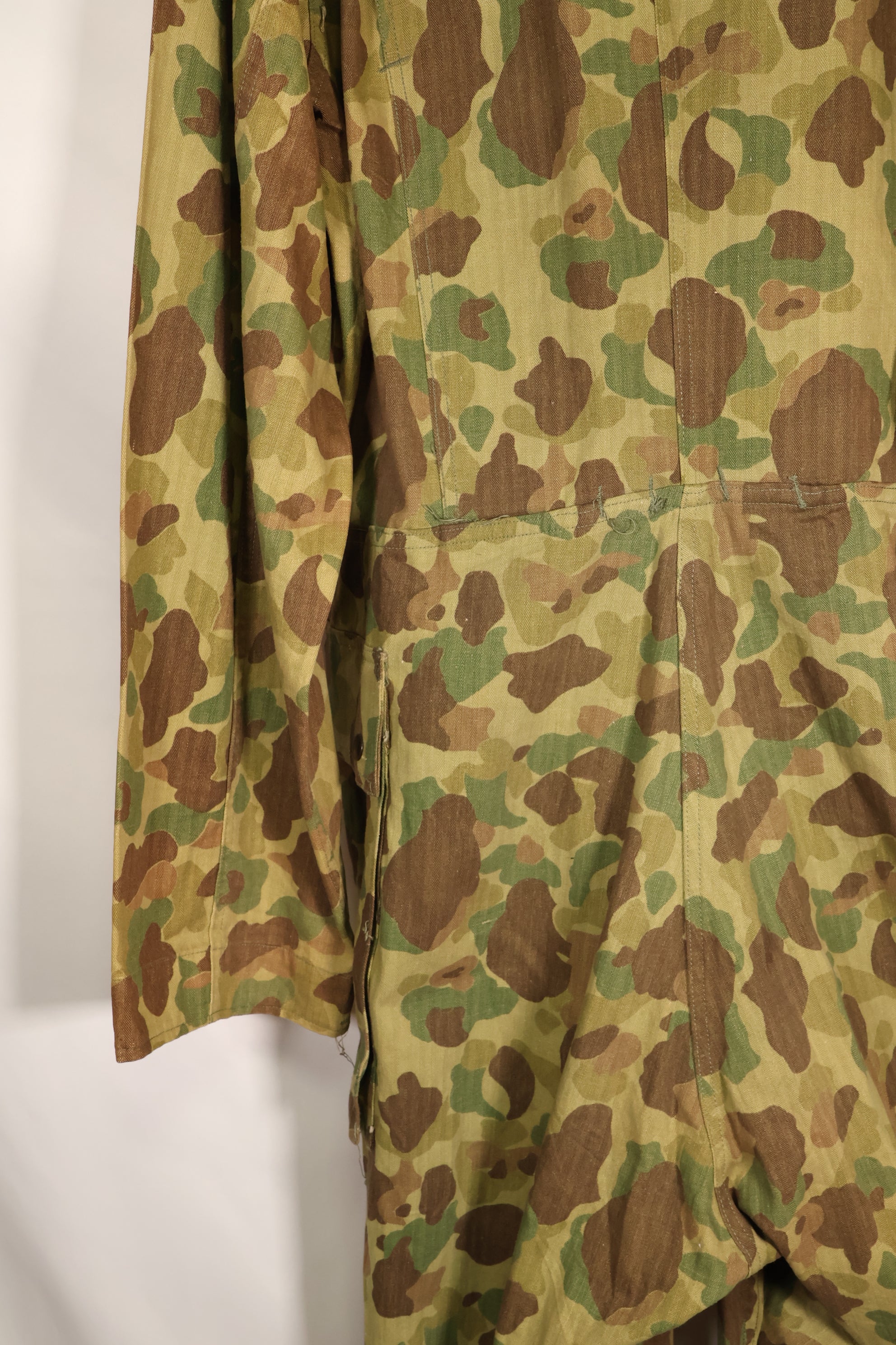 1940s U.S. Army & Marine Corps Frogskin camouflage coveralls in good condition.