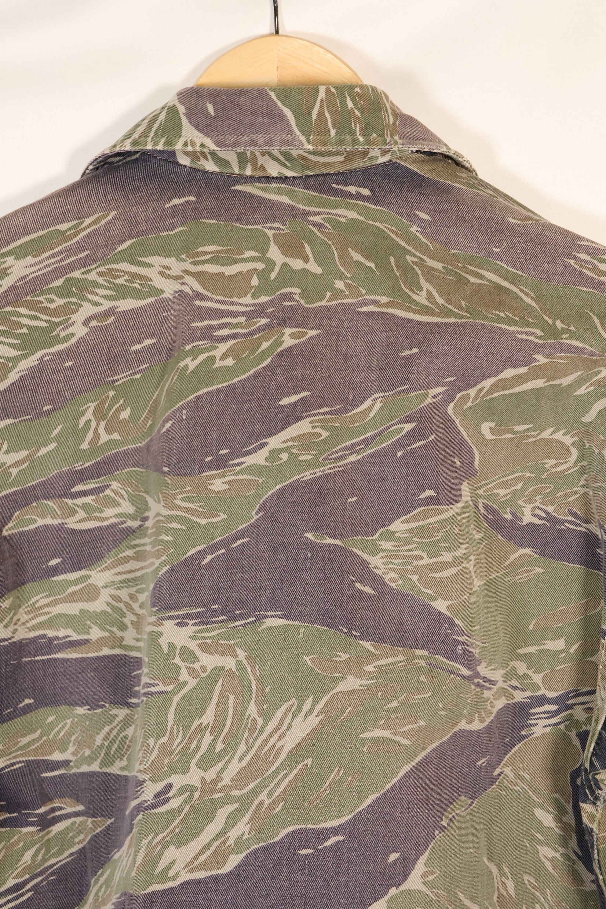 Mid-1960s Japanese Silver Tiger Asian Cut shirt with faded tiger stripes, used.