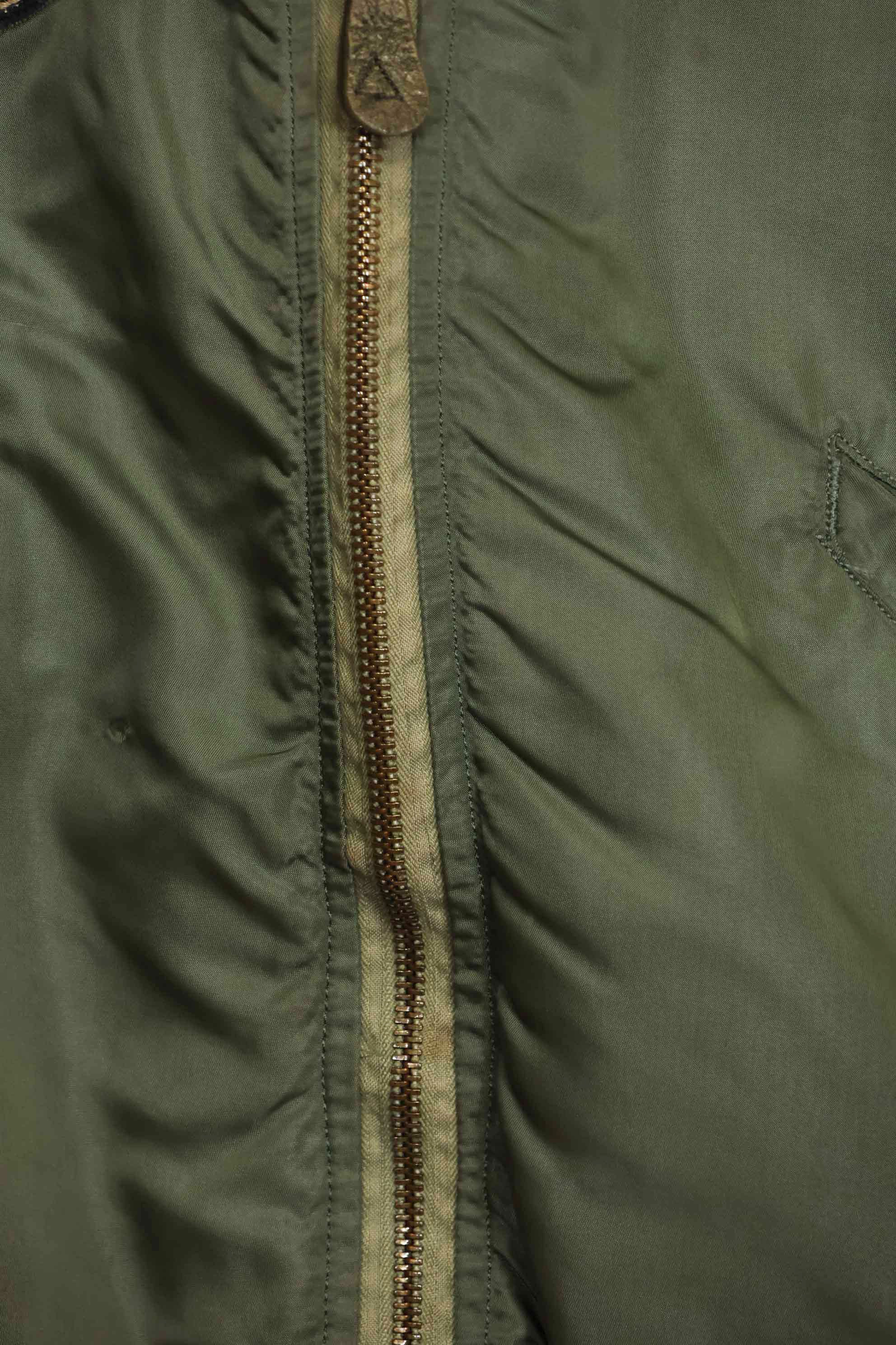 1969 Contract USAF L2-B Light Zone Flight Jacket with patches and rank insignia, used.