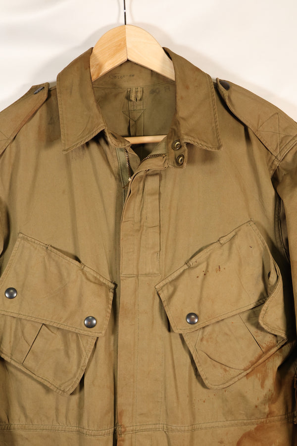 1940s 40R WWII M42 jump jacket without waist belt, stained, used.