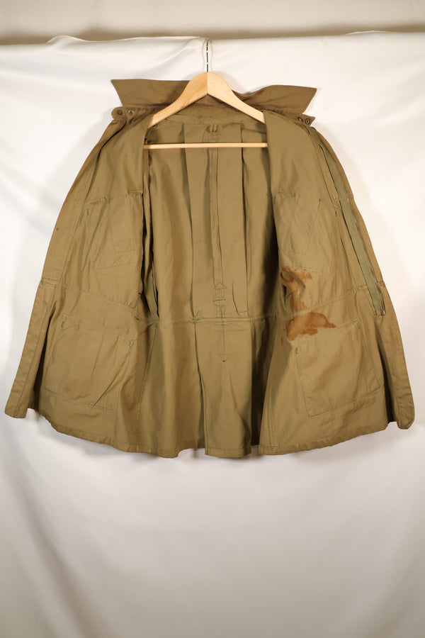 1940s 40R WWII M42 jump jacket without waist belt, stained, used.
