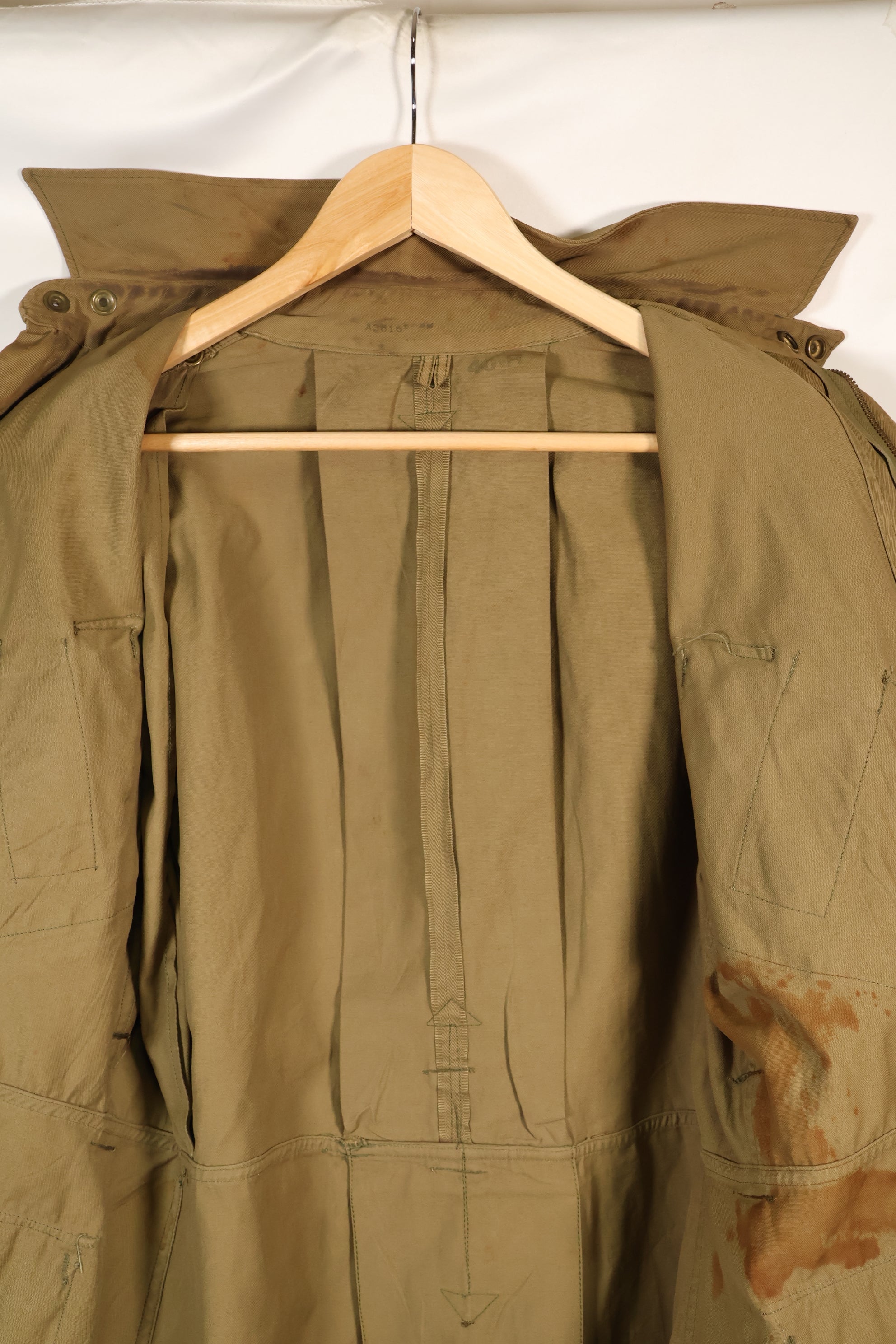 1940s 40R WWII M42 jump jacket without waist belt, stained, used.