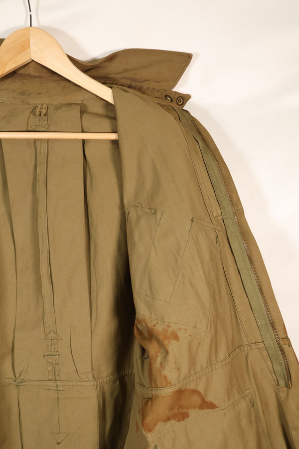 1940s 40R WWII M42 jump jacket without waist belt, stained, used.