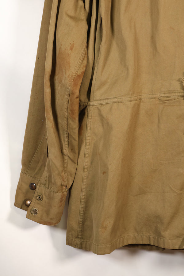 1940s 40R WWII M42 jump jacket without waist belt, stained, used.