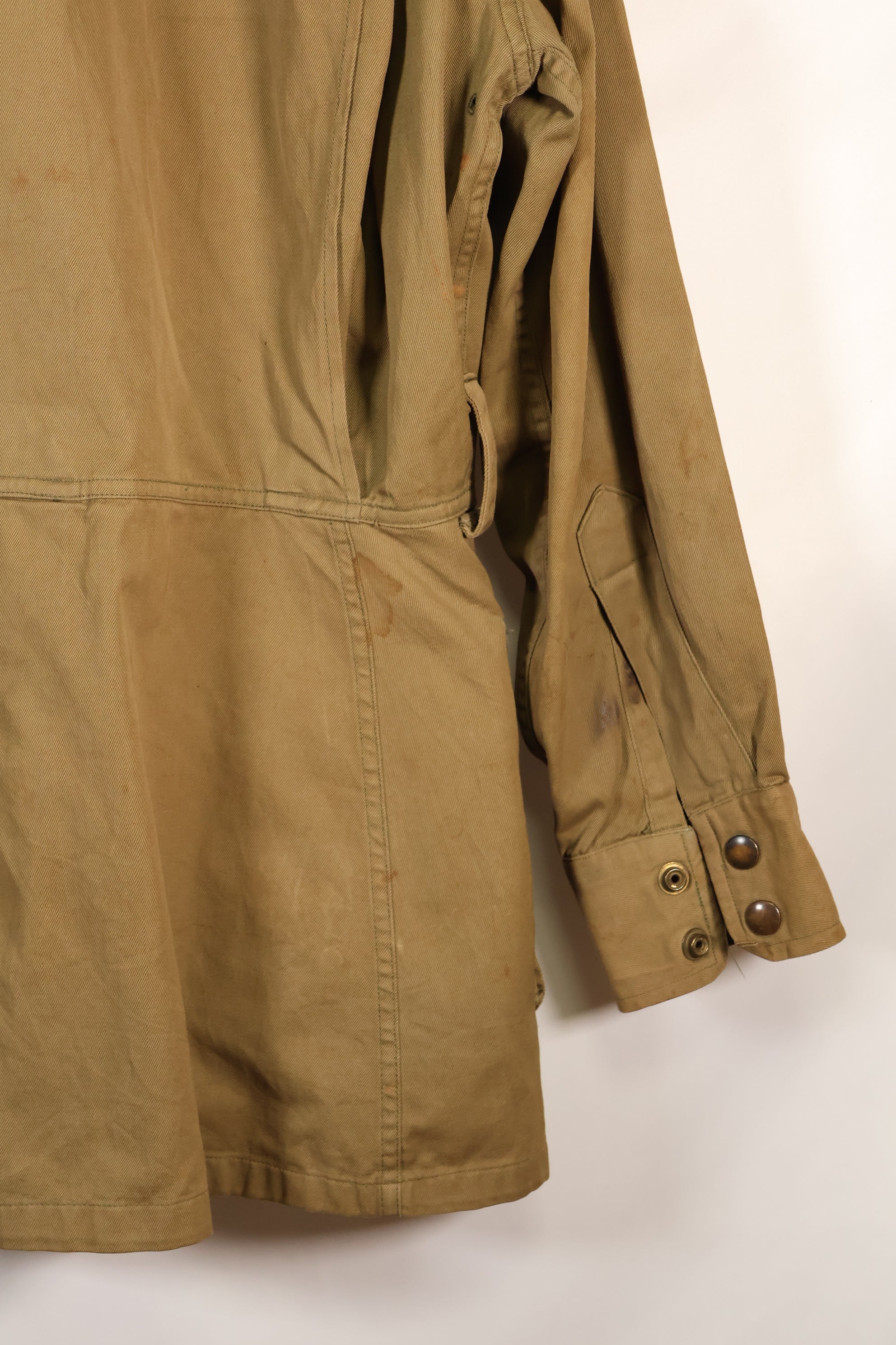 1940s 40R WWII M42 jump jacket without waist belt, stained, used.