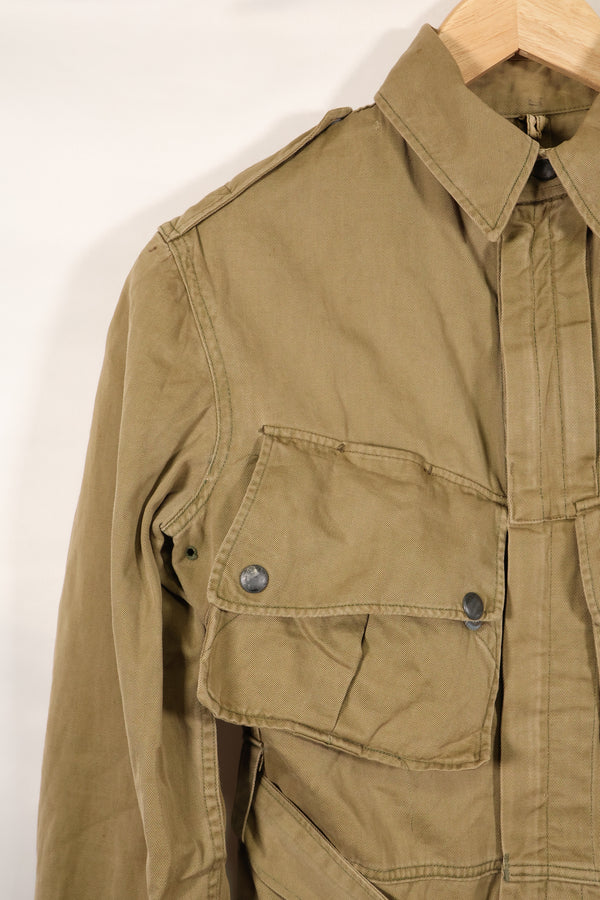 1940s estimated 38 M1942 Airborne jump jacket with button corrosion, good condition, used.