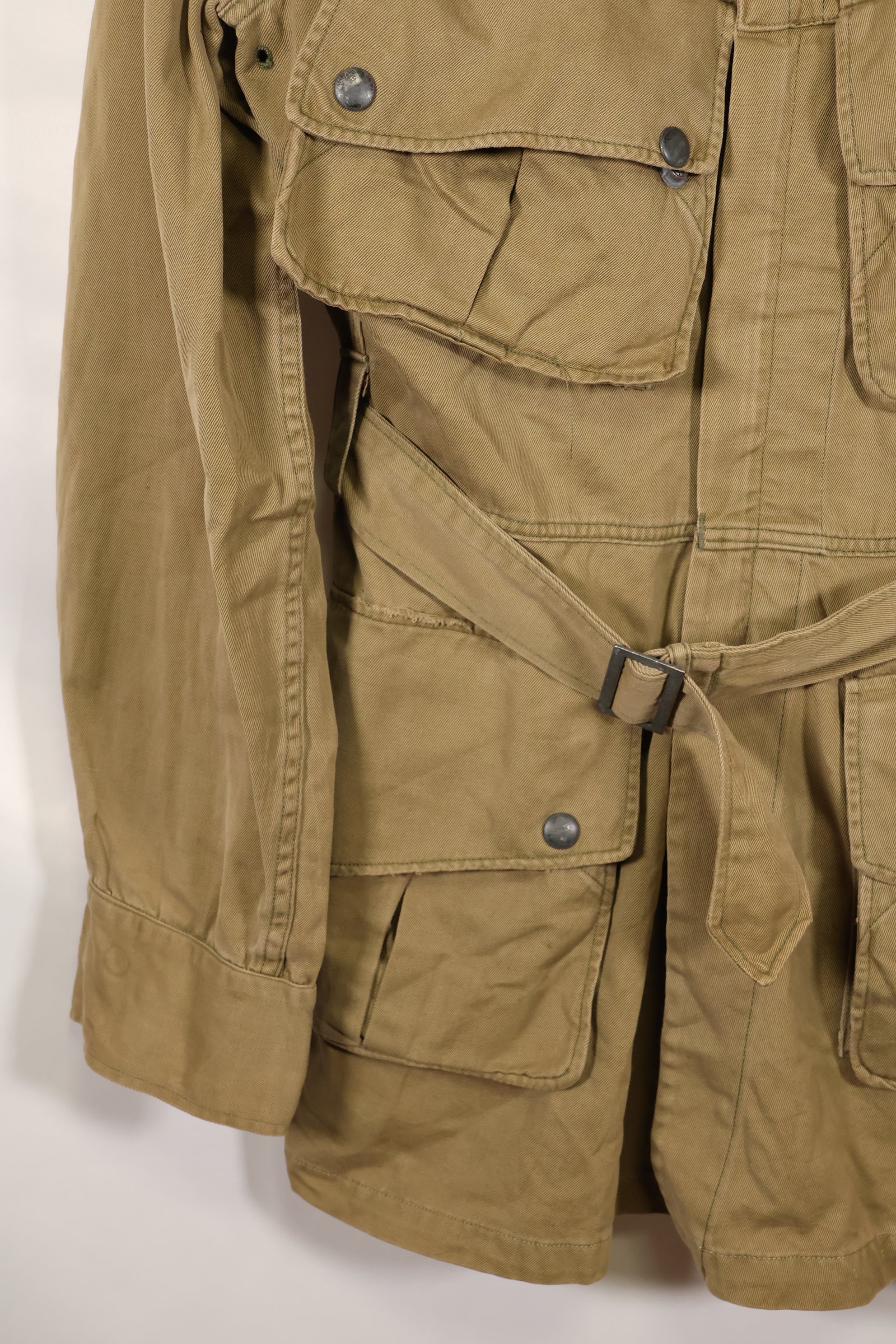 1940s estimated 38 M1942 Airborne jump jacket with button corrosion, good condition, used.