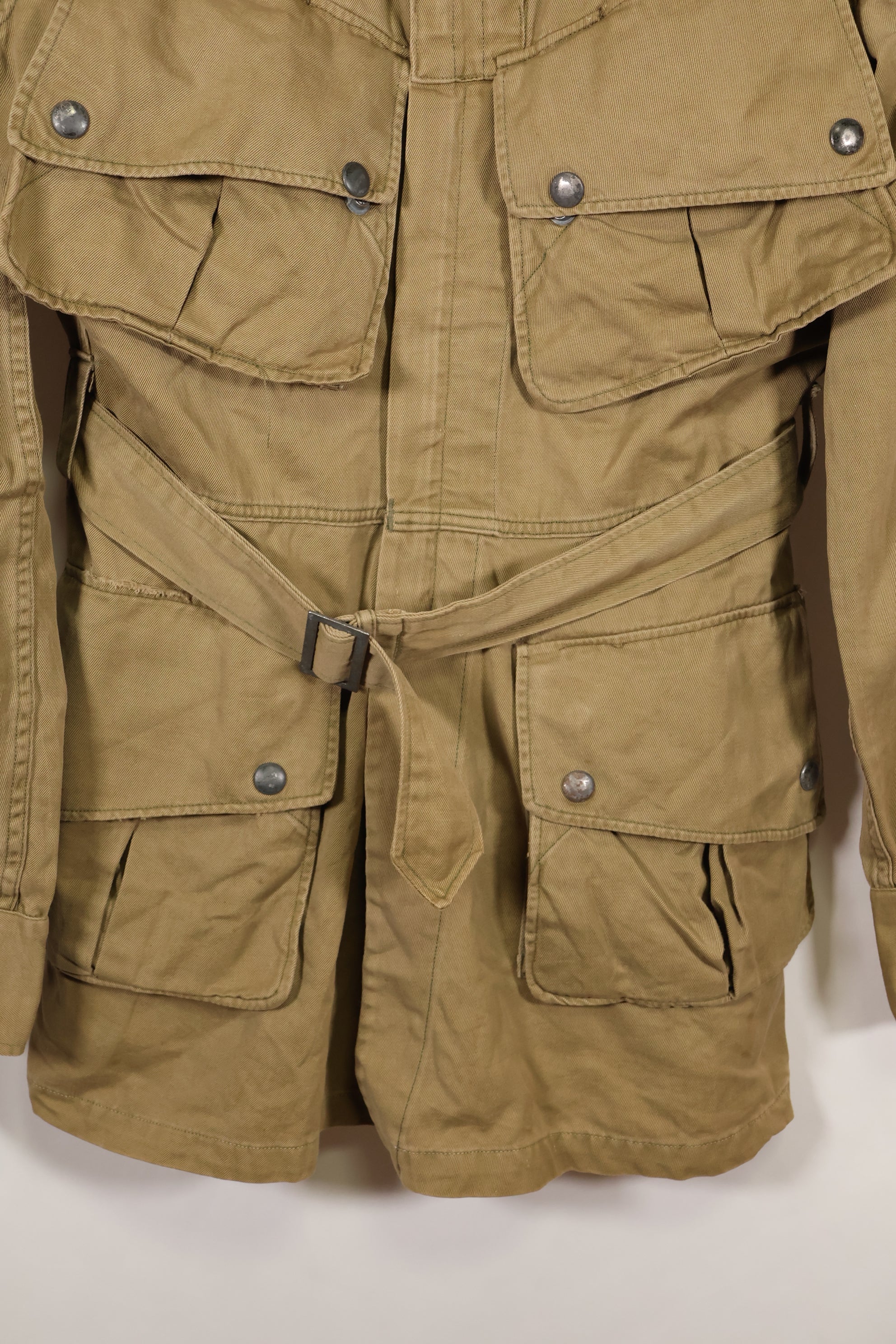 1940s estimated 38 M1942 Airborne jump jacket with button corrosion, good condition, used.