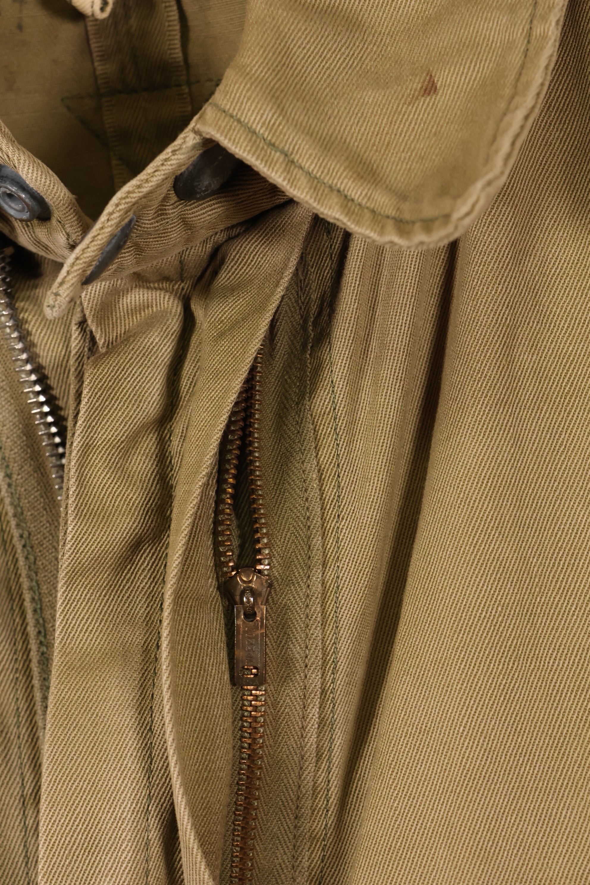 1940s estimated 38 M1942 Airborne jump jacket with button corrosion, good condition, used.