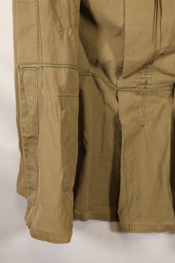 1940s estimated 38 M1942 Airborne jump jacket with button corrosion, good condition, used.