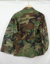 Original USAF NCO Woodland Camouflage Jacket with patch, poor condition, made in 1993.