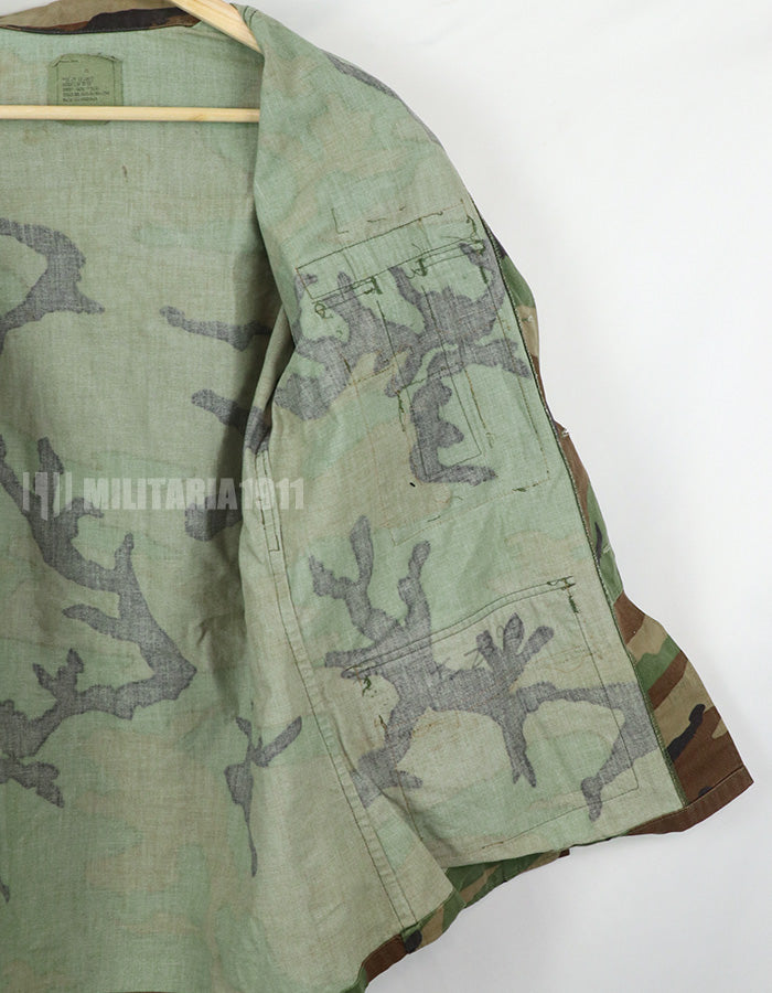 Original USAF NCO Woodland Camouflage Jacket with patch, poor condition, made in 1993.